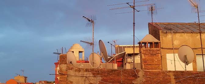 Fixation d'antenne sur cheminée